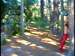 Guy fucks blonde TS in the forest