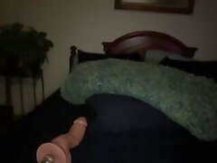 She is masturbating with huge dildo